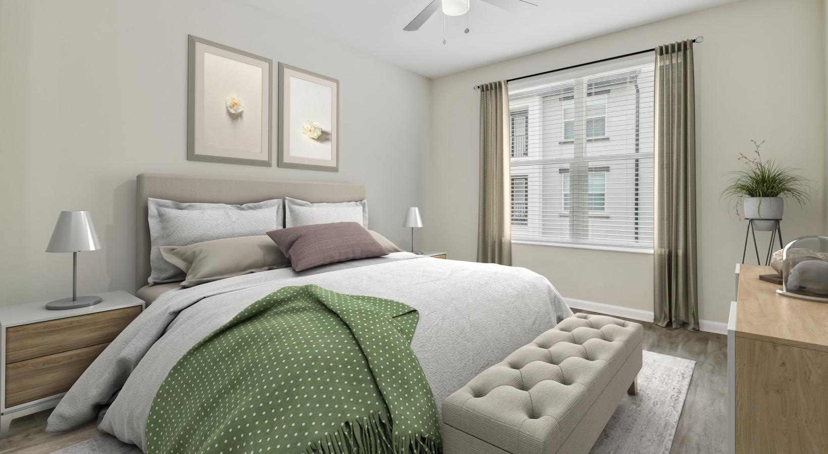 Sleep in style a bedroom with a fan and a bed