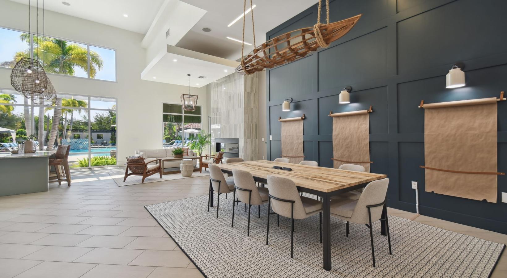 The essence of exceptional living a spacious room with a chandelier and chairs